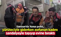 Samsun'da Yunus polisi, yürüteciyle giderken zorlanan kadını sandalyeyle taşıyıp evine bıraktı