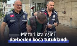 Mezarlıkta eşini darbeden koca tutuklandı