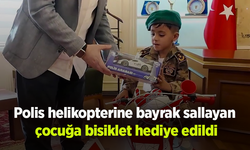 Polis helikopterine bayrak sallayan çocuğa bisiklet hediye edildi