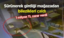 Sürünerek girdiği mağazadan bilezikleri çaldı: 1 milyon TL zarar verdi
