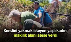 Kendini yakmak isteyen yaşlı kadın makilik alanı ateşe verdi