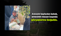 Annesini kaybeden bebek, annesinin mezarı başında gözyaşlarına boğuldu.