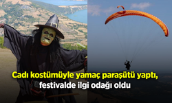 Cadı kostümüyle yamaç paraşütü yaptı, festivalde ilgi odağı oldu