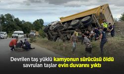 Devrilen taş yüklü kamyonun sürücüsü öldü, savrulan taşlar evin duvarını yıktı