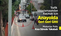 Trafik Uygulamasından Kaçmak İçin Anayolda Geri Geri Gitti, Motorize Polis Kısa Sürede Yakaladı