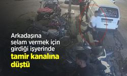 Arkadaşına selam vermek için girdiği işyerinde tamir kanalına düştü