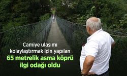 Camiye ulaşımı kolaylaştırmak için yapılan 65 metrelik asma köprü ilgi odağı oldu