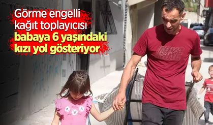 Görme engelli kağıt toplayıcısı babaya 6 yaşındaki kızı yol gösteriyor