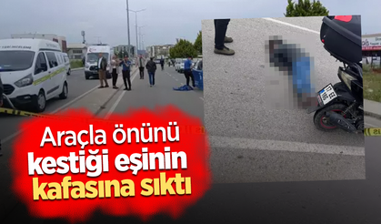 Araçla önünü kestiği eşinin kafasına sıktı