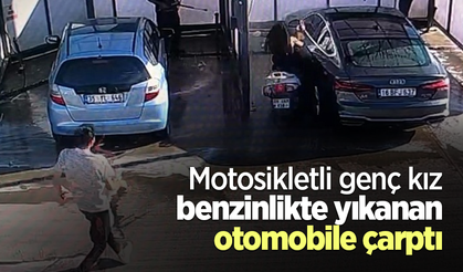 Motosikletli genç kız benzinlikte yıkanan otomobile çarptı