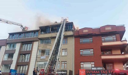 Bir binanın en üst katından korkutan yangın