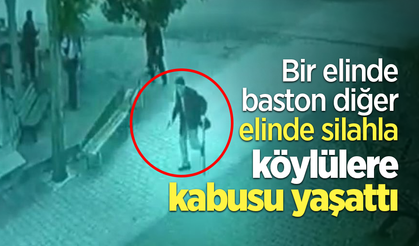 Bir elinde baston diğer elinde silahla köylülere kabusu yaşattı