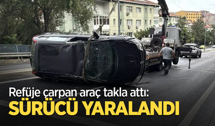 Refüje çarpan araç takla attı: Sürücü yaralandı