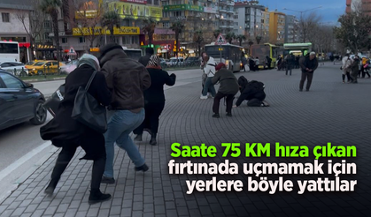 Saatte 75 KM hıza çıkan fırtınada uçmamak için yerlere böyle yattılar