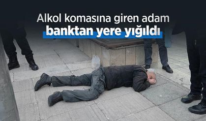 Alkol komasına giren adam banktan yere yığıldı