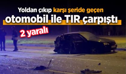 Yoldan çıkıp karşı şeride geçen otomobil ile TIR çarpıştı; 2 yaralı