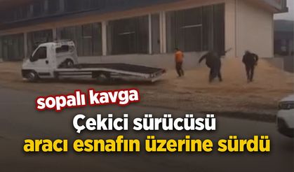 Sopalı kavga: Çekici sürücüsü aracı esnafın üzerine sürdü
