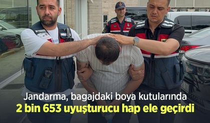Jandarma, bagajdaki boya kutularında 2 bin 653 uyuşturucu hap ele geçirdi