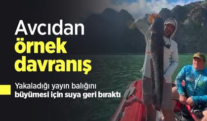 Avcıdan örnek davranış: Yakaladığı yayın balığını büyümesi için suya geri bıraktı