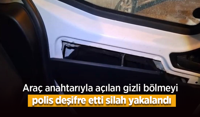 Araç anahtarıyla açılan gizli bölmeyi polis deşifre etti, silah ele geçirildi.