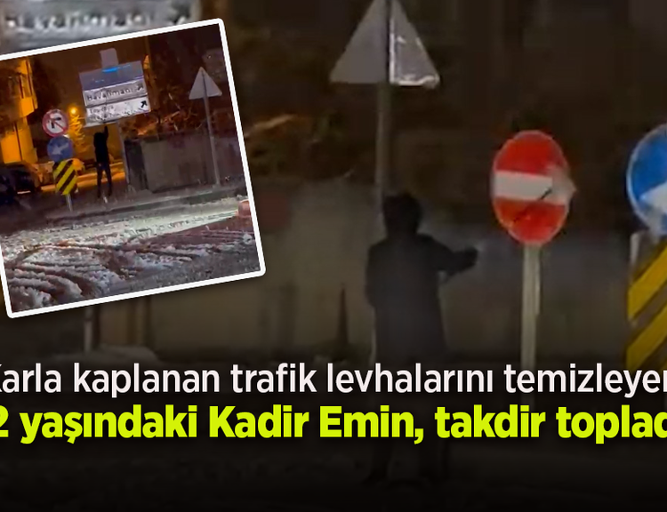 Karla kaplanan trafik levhalarını temizleyen 12 yaşındaki Kadir Emin, takdir topladı