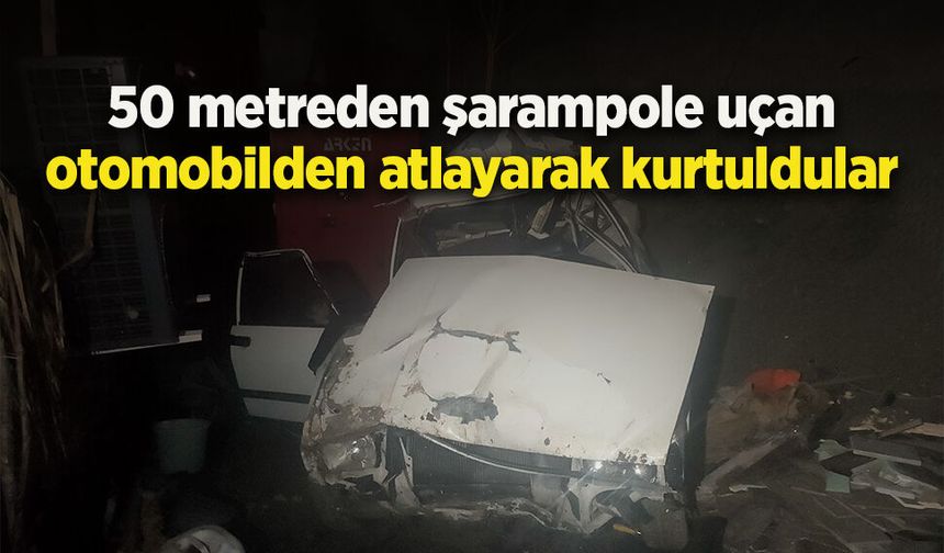 50 metreden şarampole uçan otomobilden atlayarak kurtuldular