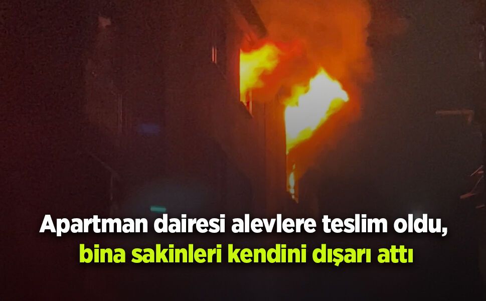 Apartman dairesi alevlere teslim oldu, bina sakinleri kendini dışarı attı