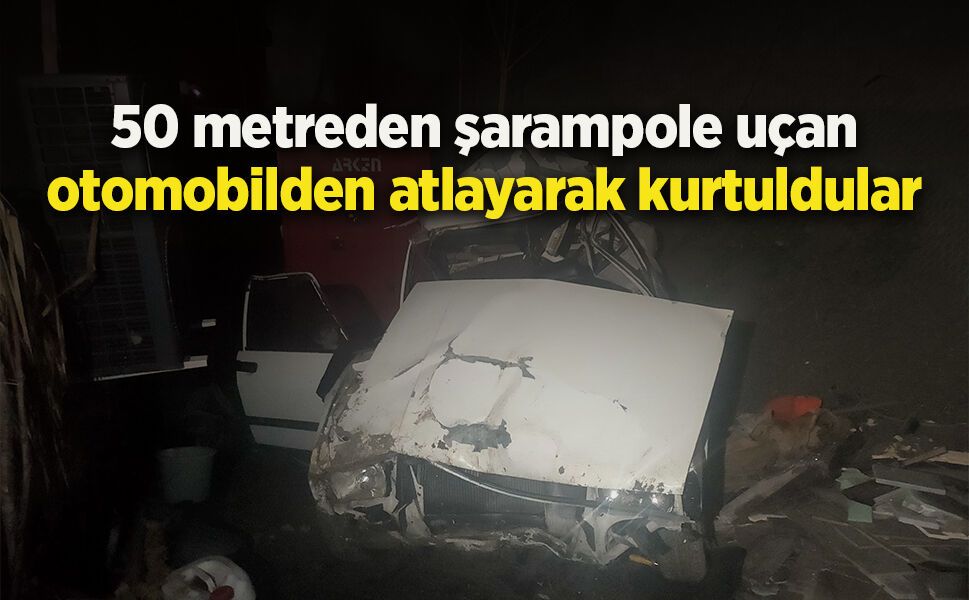 50 metreden şarampole uçan otomobilden atlayarak kurtuldular